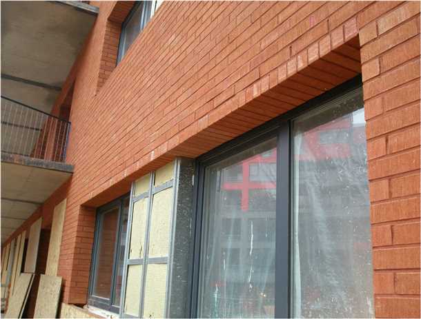 Как осуществить облицовку окон кирпичом: советы специалистов