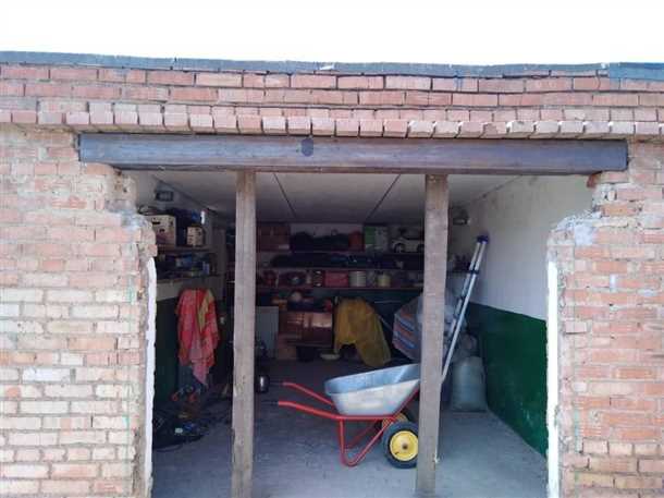 Использование специальной техники при поднятии гаража