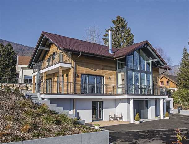 Проект дома на склоне с цокольным этажом Проект дома на склоне с цокольным этажом